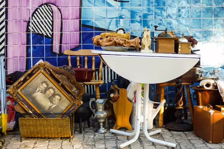 Discover hidden gems on a Lisbon Like a Local Private Tour, featuring vintage treasures at a charming local flea market.
