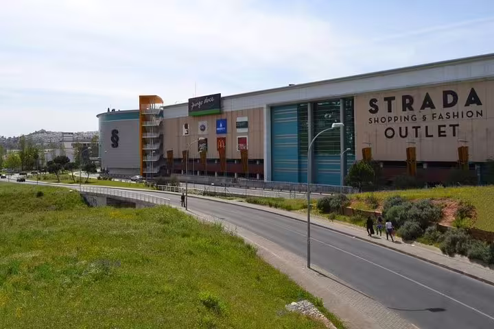 Modern shopping center in Lisbon, perfect for a half-day private outlet tour featuring top fashion and lifestyle brands.