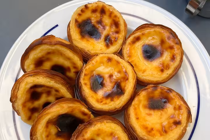 Savor Lisbon's famous Pastéis de Nata, a must-try treat on your private culinary tour through the city.
