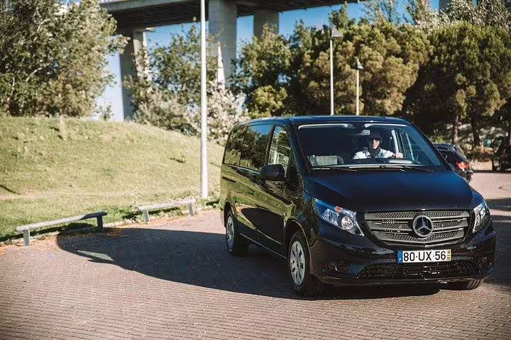 Comfortable transport for the Lisbon to Porto private day trip, featuring a sleek Mercedes van ready for multiple scenic stops.