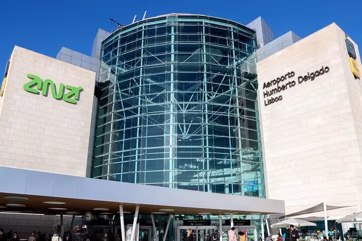 Exterior view of Lisbon's Humberto Delgado Airport, a starting point for private transfers to Porto.