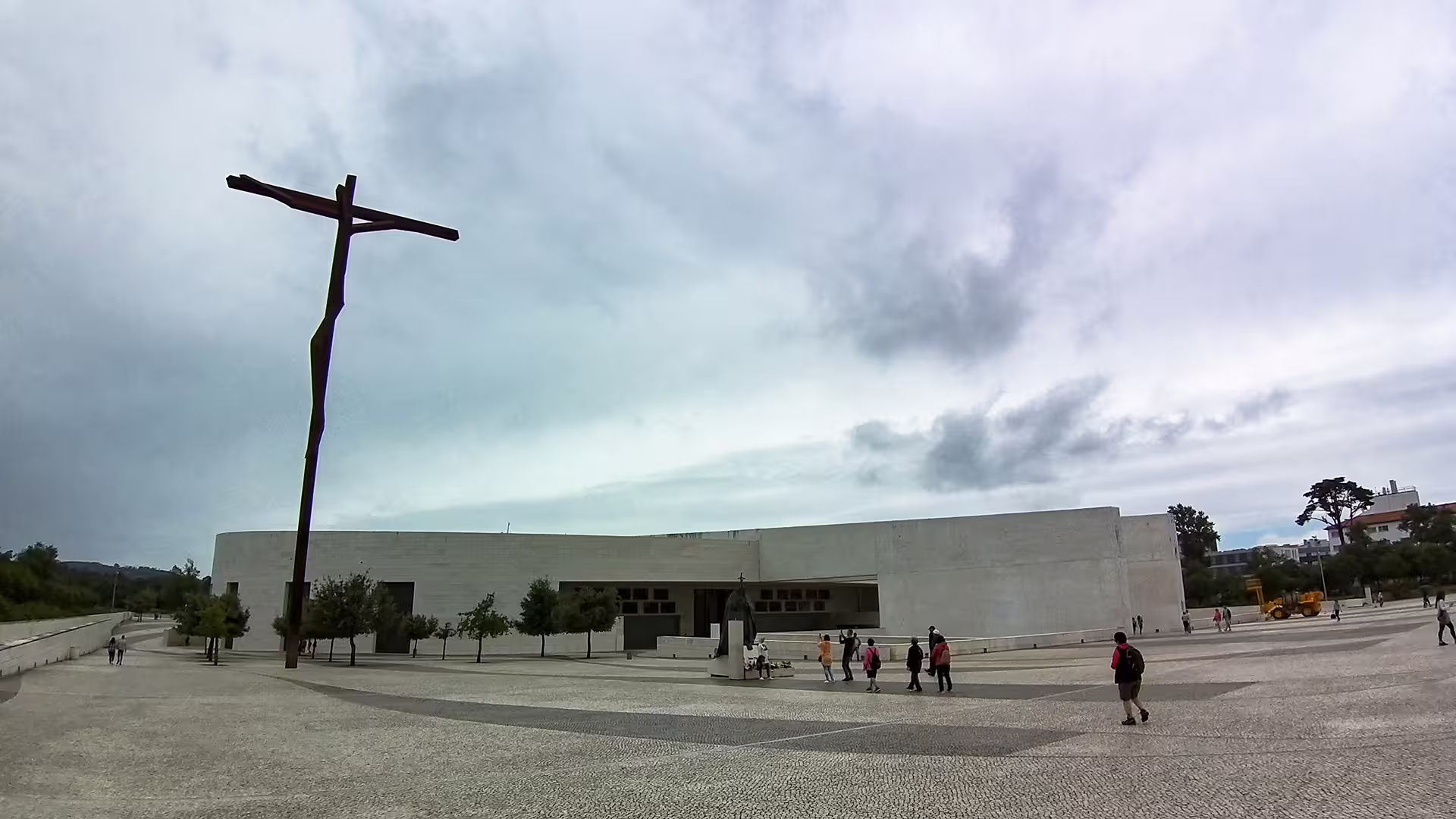 Modern architecture and large cross at the Sanctuary of Fátima, a key stop on the private Lisbon to Porto tour.