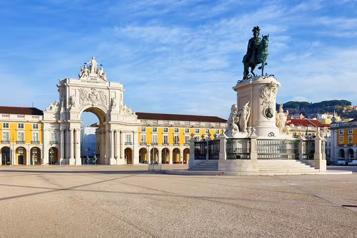 Explore Lisbon's Praça do Comércio with its iconic Arco da Rua Augusta and equestrian statue on a private half-day historic tour.