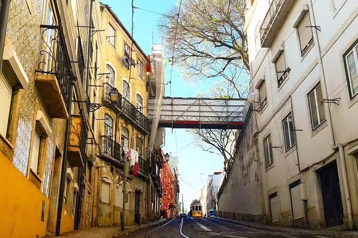 Explore Lisbon's charming streets with a premium private tour, featuring custom stops and iconic tram views.