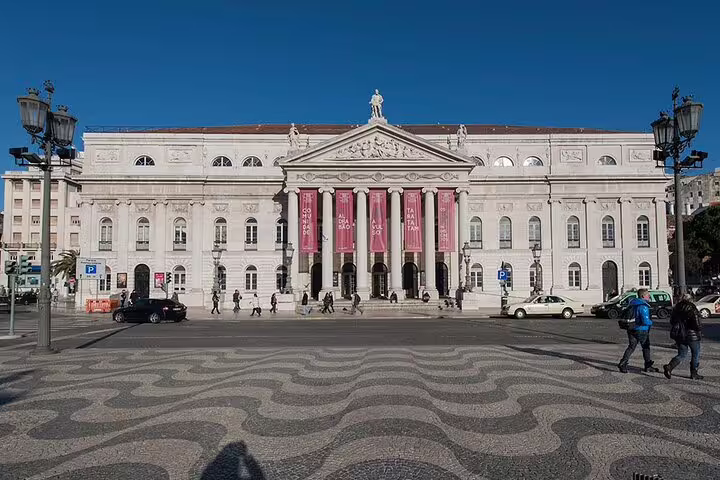 Stunning view of Lisbon's iconic theater with intricate tile patterns, perfect for a small group walking tour.