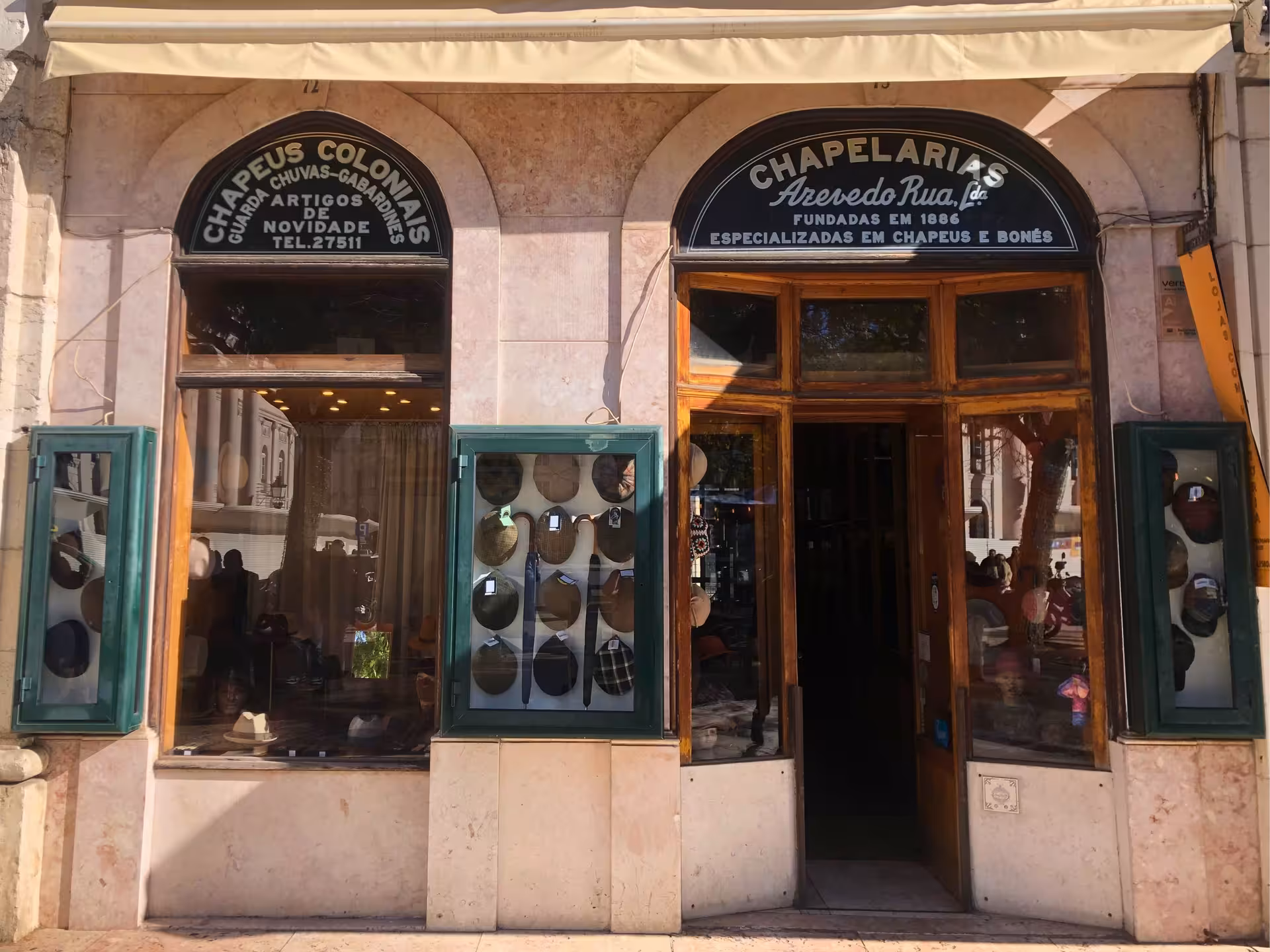 Traditional Lisbon hat shop storefront on Old Shops, Traditions & Stories walking tour in Baixa district