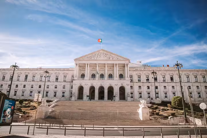 Visit the grand São Bento Palace, home to Portugal's Parliament, on a scenic Tuk Tuk ride through Lisbon.