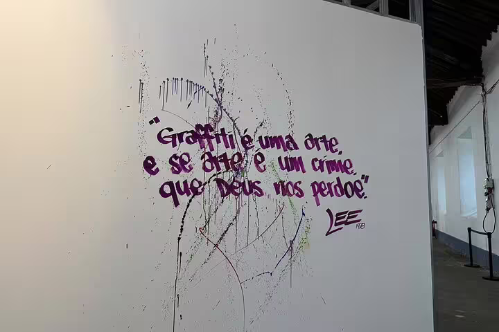 Graffiti art in Lisbon with a thought-provoking quote, highlighting the intersection of urban art and expression.