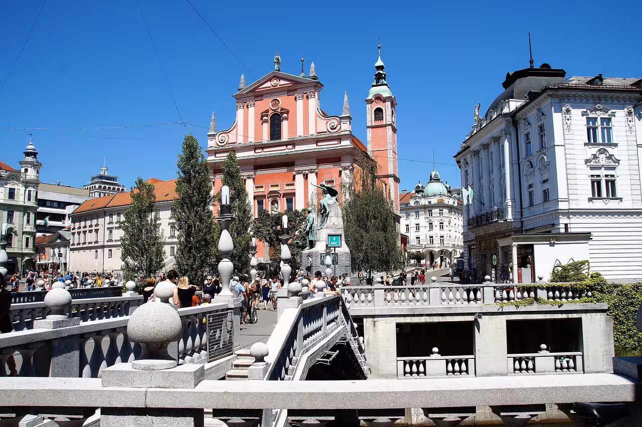 Ljubljana city center view from Triple Bridge, with Franciscan Church and Preseren Square on guided tour