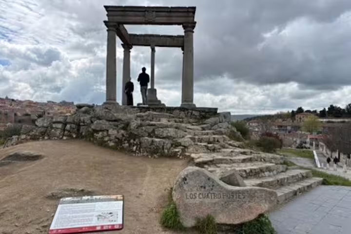 Los Cuatro Postes monument viewpoint in Avila on a half-day private minivan tour, overlooking the old town
