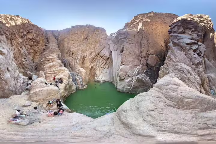 Lost Lake green oasis pool in Sinai mountains, stop on private Jeep safari and Dahab day trip from Sharm El Sheikh