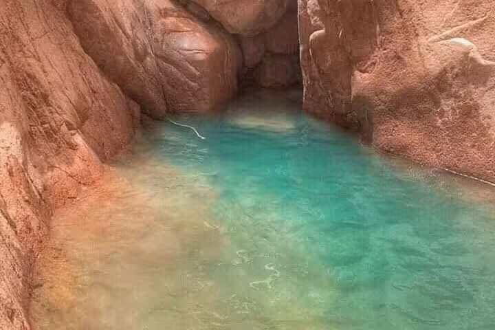 Turquoise Lost Lake lagoon in Sinai canyon, stop on private Jeep safari from Sharm El Sheikh to Dahab