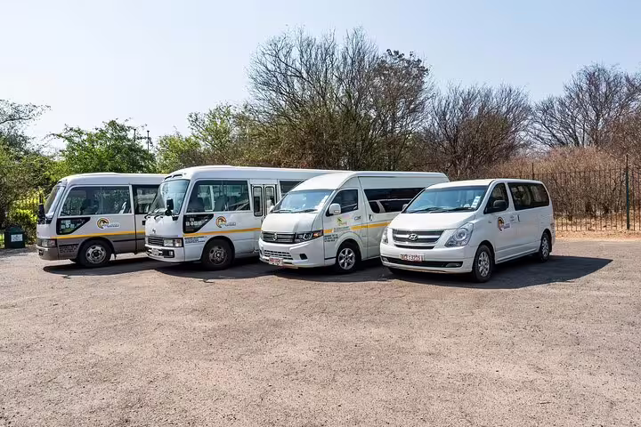 Fleet of private vans ready for Luxor Airport private transfer service, reliable door-to-door transport in Egypt