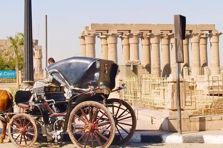 Private Luxor horse carriage parked by Karnak Temple columns, classic calèche sightseeing tour in Luxor