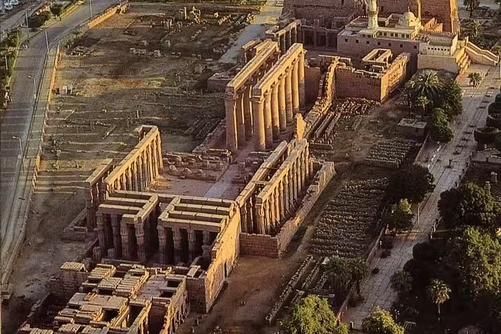Aerial view of Karnak Temple complex in Luxor at sunrise, seen on VIP hot air balloon tour over Nile
