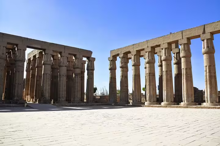Luxor Temple colonnade in bright sun, a highlight on a 5 days 4 nights Cairo to Luxor Egypt tour