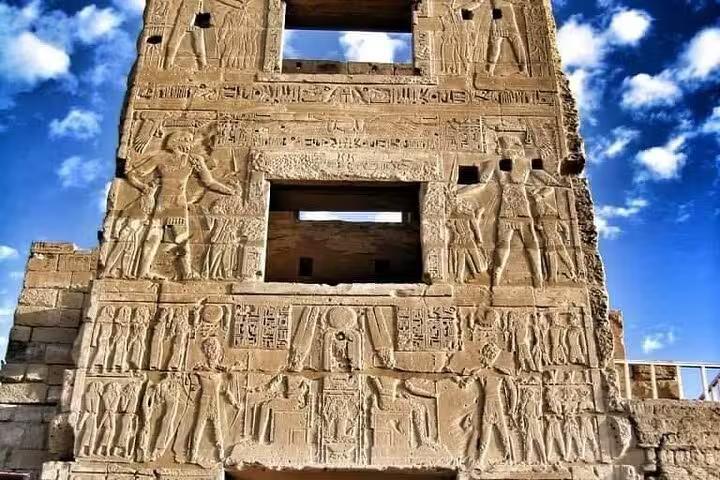Luxor Temple stone wall carvings and hieroglyphs, highlight of private Hurghada to Luxor day tour