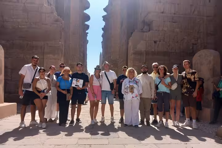 Tour group at Luxor Temple entrance on Sharm El Sheikh to Luxor flight excursion, guided Egypt day tour
