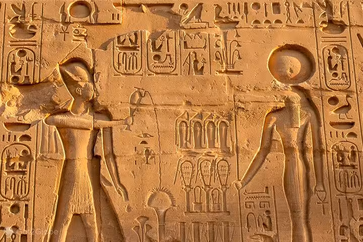 Ancient Egyptian wall relief at Luxor Temple, highlight of 2-day private Luxor and Dendera tour from Hurghada