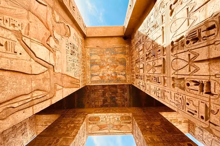 Hieroglyph-covered temple ceiling in Luxor, a highlight on a full-day Valley of the Kings tour