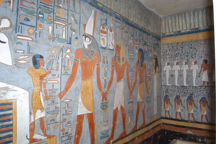 Ancient Egyptian wall art and hieroglyphs inside Luxor tomb, Valley of the Kings day tour from Hurghada
