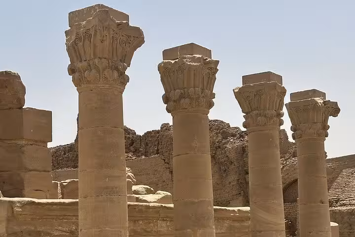 Majestic ancient columns at Luxor's West Bank, highlighting the grandeur of Egyptian architectural heritage.