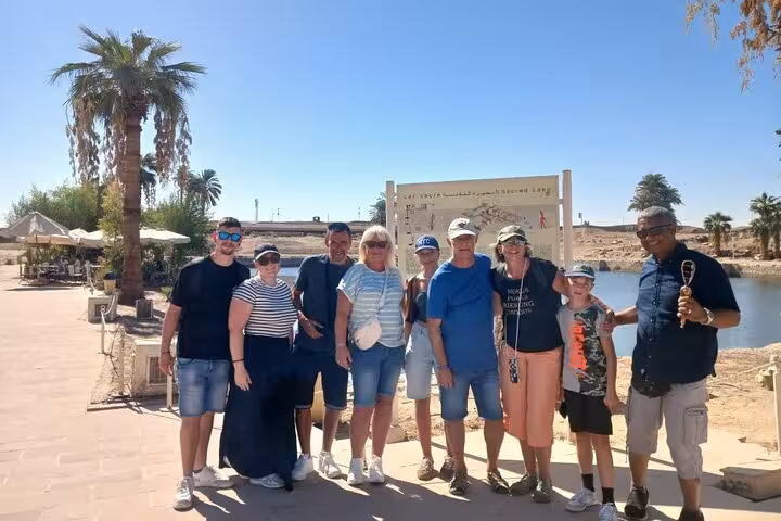 Travelers with guide at Luxor West Bank stop on Cairo to Luxor by plane small-group tour, Egypt