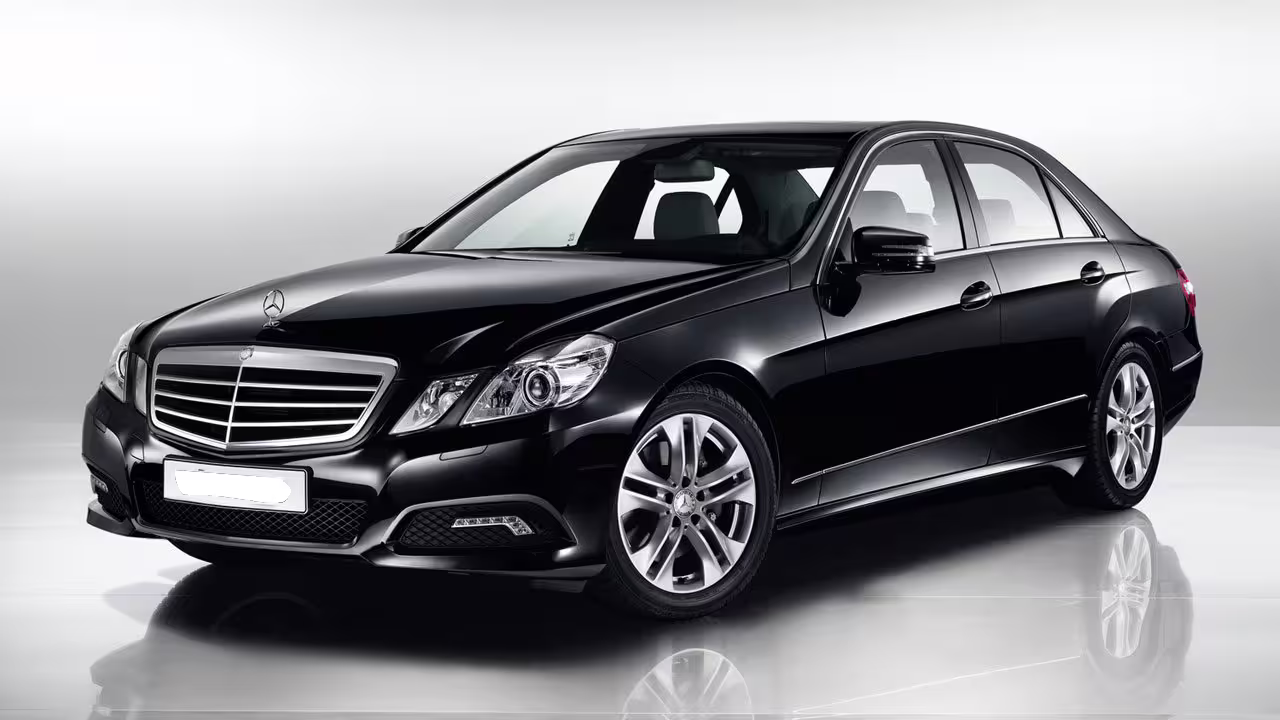 Luxury black sedan for private transfer from Naples to Rome with professional driver and door-to-door service