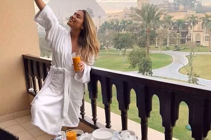 Luxury Cairo hotel balcony breakfast near Giza, ideal start for VIP all-inclusive pyramids tour