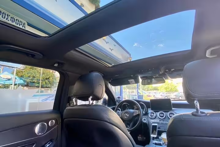 Luxury Mercedes interior with panoramic sunroof for Best of Athens half day private tour and chauffeured ride