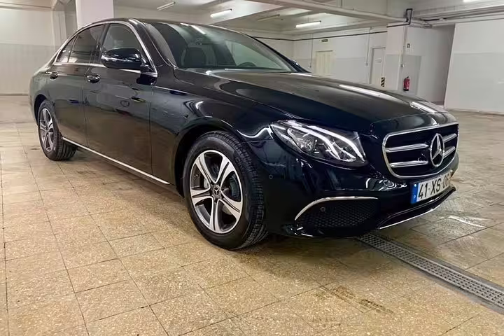 Luxury Mercedes sedan for Sintra, Cabo da Roca, Cascais, and Estoril private panoramic tour, offering comfort and style.