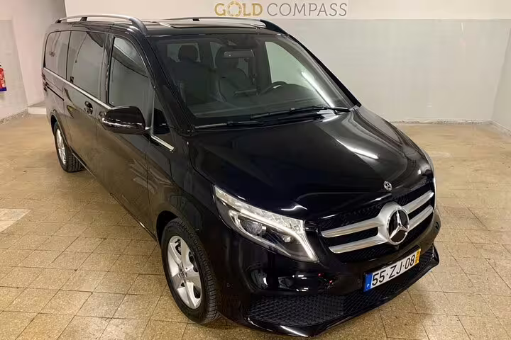 Luxury black Mercedes van for Algarve to Lisbon private journey, featuring spacious interior and sleek design for direct travel.
