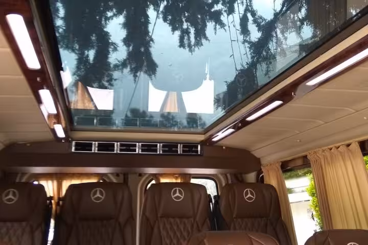 Luxury Mercedes van interior with panoramic roof for private transfer from Piraeus Port or hotel to Athens Airport