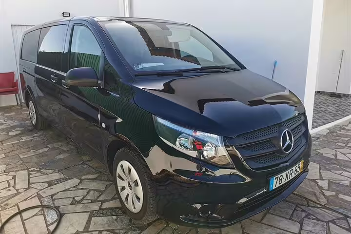 Luxurious black Mercedes van for private transfers to Faro, Albufeira, Alvor, Seville, Lisbon, and Lagos.
