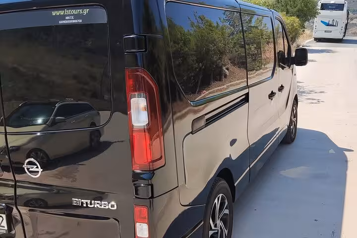 Rear side view of luxury minivan for Athens Airport to Piraeus Port private transfer with chauffeur service