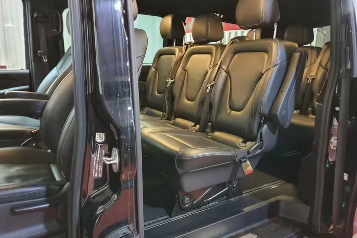 Luxury private van interior for Atocha train station to Madrid transfer with spacious leather seats