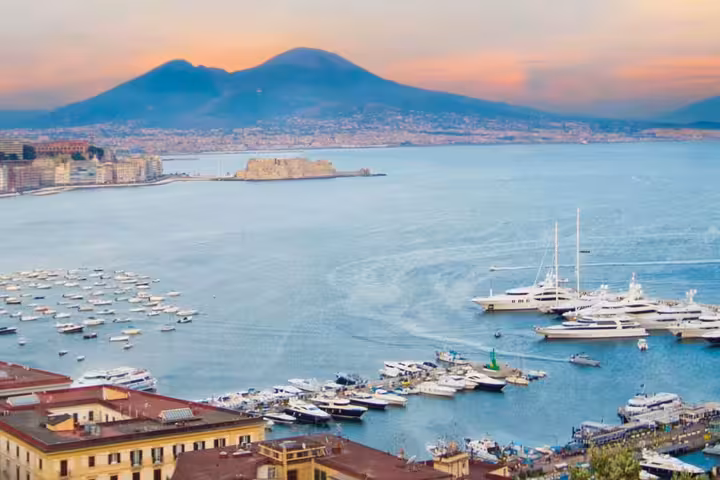 Luxury black sedan for private transfer from Naples to Caserta, door-to-door chauffeur service in Italy