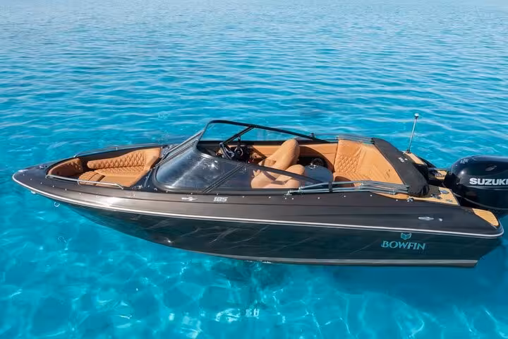 Luxury private speedboat in Hurghada Red Sea, perfect for dolphin watching tour and snorkeling at reefs
