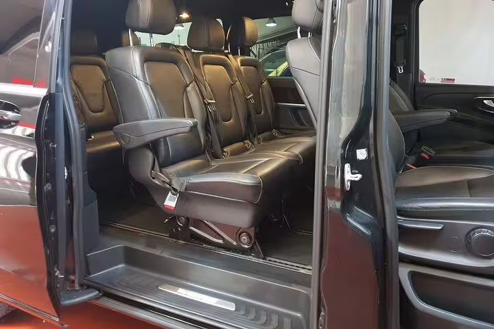 Luxury van interior with leather seats for private transportation to Madrid Airport, door-to-door hotel pickup