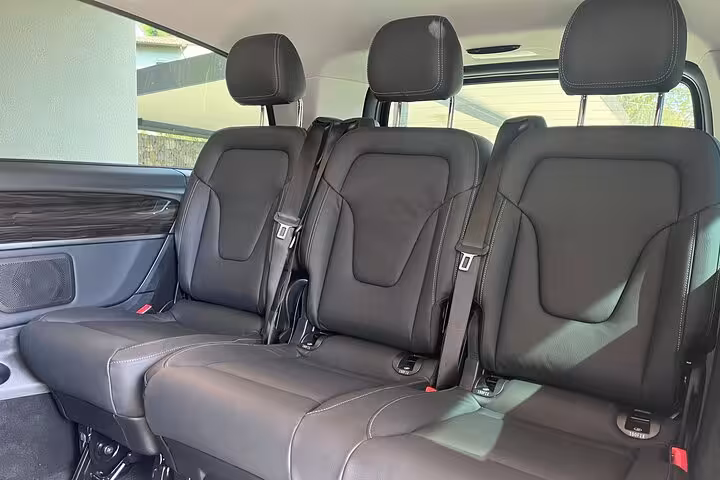 Luxury van seating offering comfort and style for a private transfer journey from Milan to Nice.