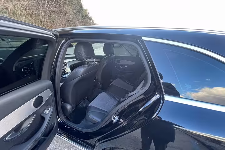 Spacious interior of a luxury vehicle, perfect for a comfortable private transfer from Naples to Positano.