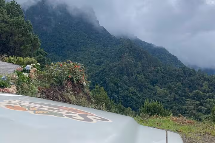 Off-road Madeira 4x4 expedition view of misty Laurisilva mountains near Fanal Forest and skywalk