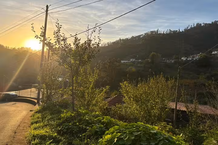 Sunset over a rural Madeira valley and village, scenic stop on Cultural Rural Madeira 4x4 tour