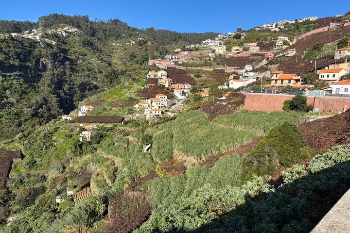 Terraced hillsides and traditional houses in rural Madeira, panoramic view on Cultural Rural Madeira 4x4