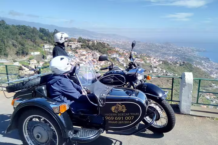 Sidecar tour in Madeira offering panoramic views of the coastline and mountains, perfect for an adventurous scenic ride.