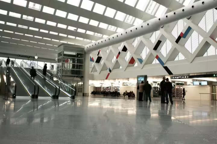 Modern Madrid Atocha Station interior, arrival point for private transfer with hotel pickup and drop-off