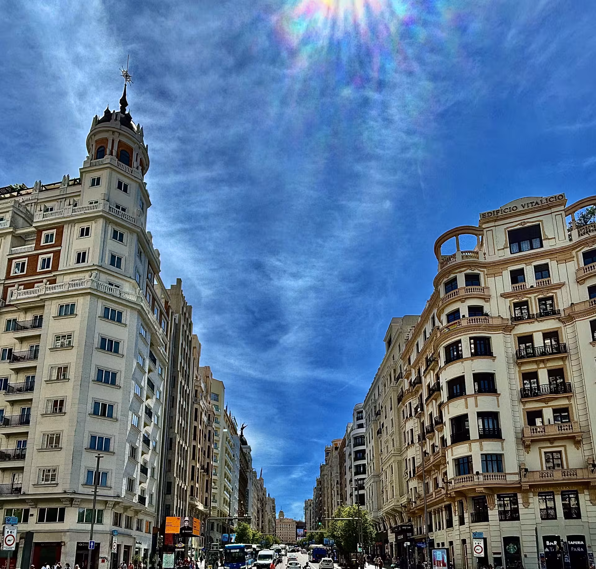 Gran Vía avenue view in Madrid with historic buildings, part of Secretos Locales walking tour with Thyssen and lunch
