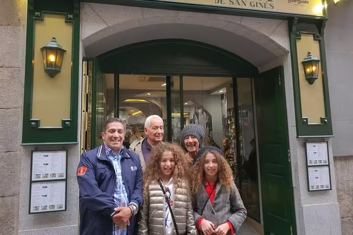 Private day trip Madrid to Toledo with driver-guide, group photo outside historic Madrid meeting point