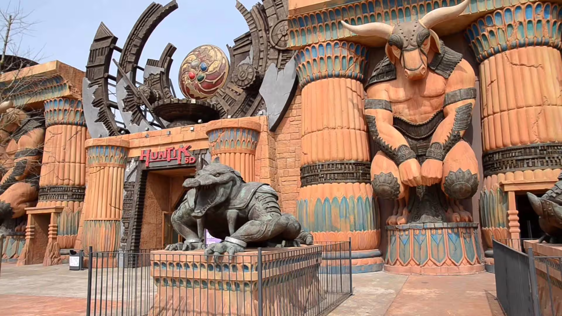 MagicLand entrance with Egypt-themed statues and columns, iconic facade for MagicLand amusement park tickets