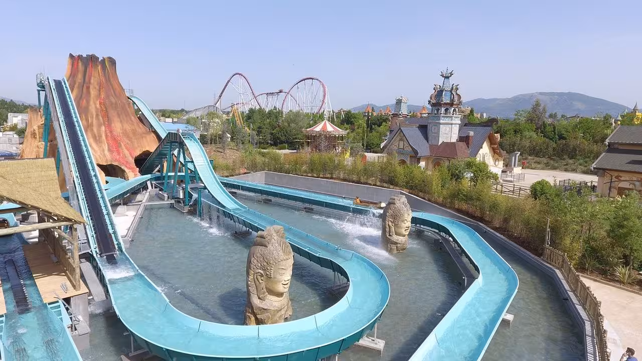 MagicSplash water ride and splashdown at MagicLand near Rome, with volcano theme and coasters in view